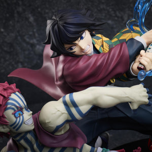 Medium close-up of Giyu Tomioka striking with water effects while Akaza smiles in the Demon Slayer Aniplex figure