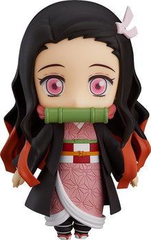 Front view of Nezuko Kamado Nendoroid from Demon Slayer with her signature bamboo gag and pink kimono.