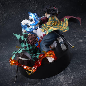 High-angle rear view of the Aniplex Demon Slayer Tanjiro, Giyu, and Akaza figure highlighting haori patterns and flame effect sculpts
