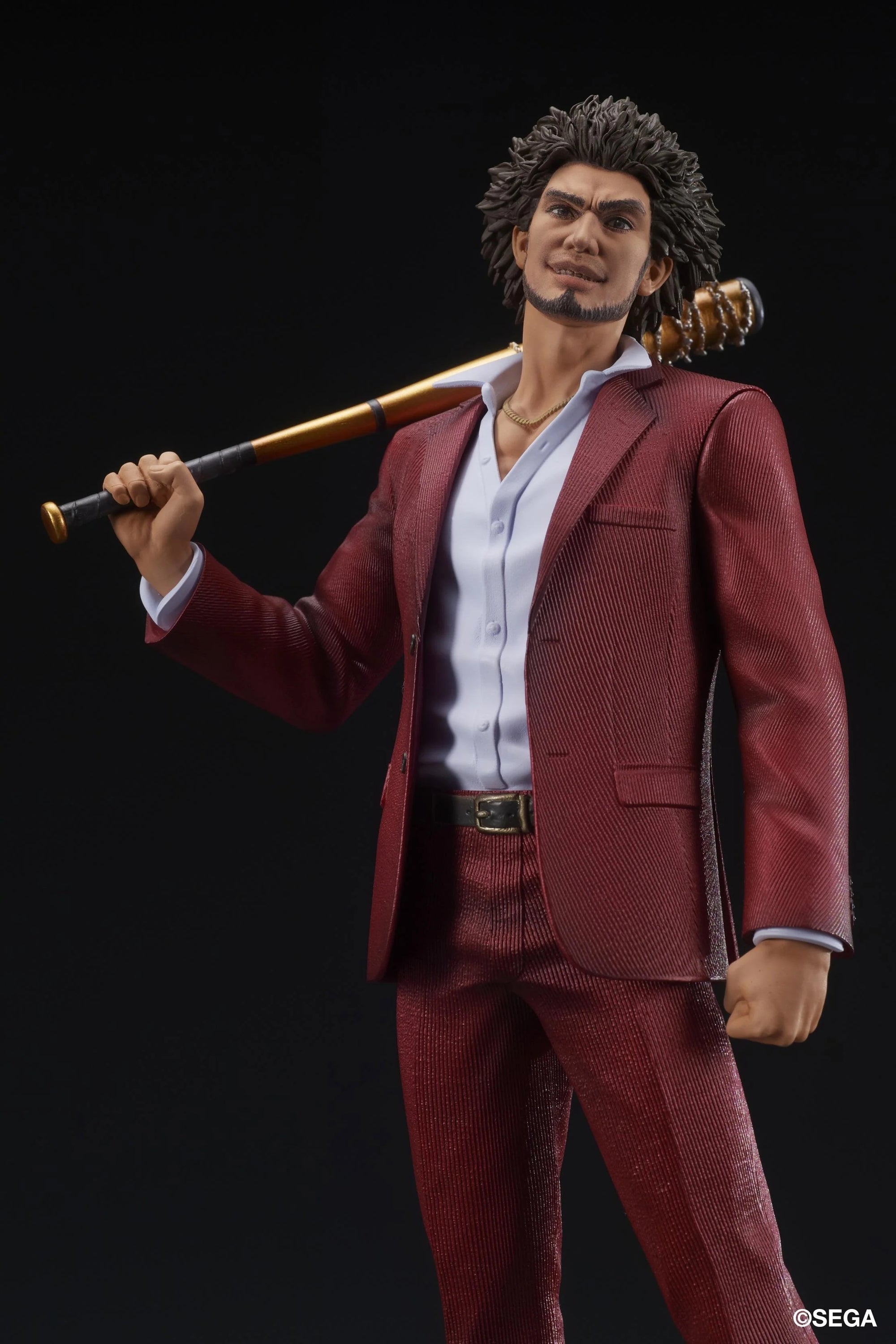 A close-up of the Ichiban Kasuga figure, focusing on his face and the spiked golden bat over his shoulder.