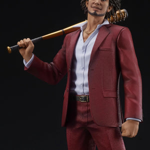 A close-up of the Ichiban Kasuga figure, focusing on his face and the spiked golden bat over his shoulder.