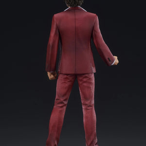 Rear view of the Ichiban Kasuga figure, showcasing the back of his red suit and the Dragon Fish design on the display base.