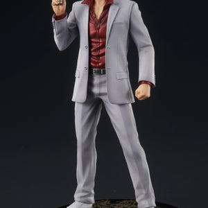 The Kazuma Kiryu figure posed holding the Staminan X recovery drink accessory, ready for a fight.