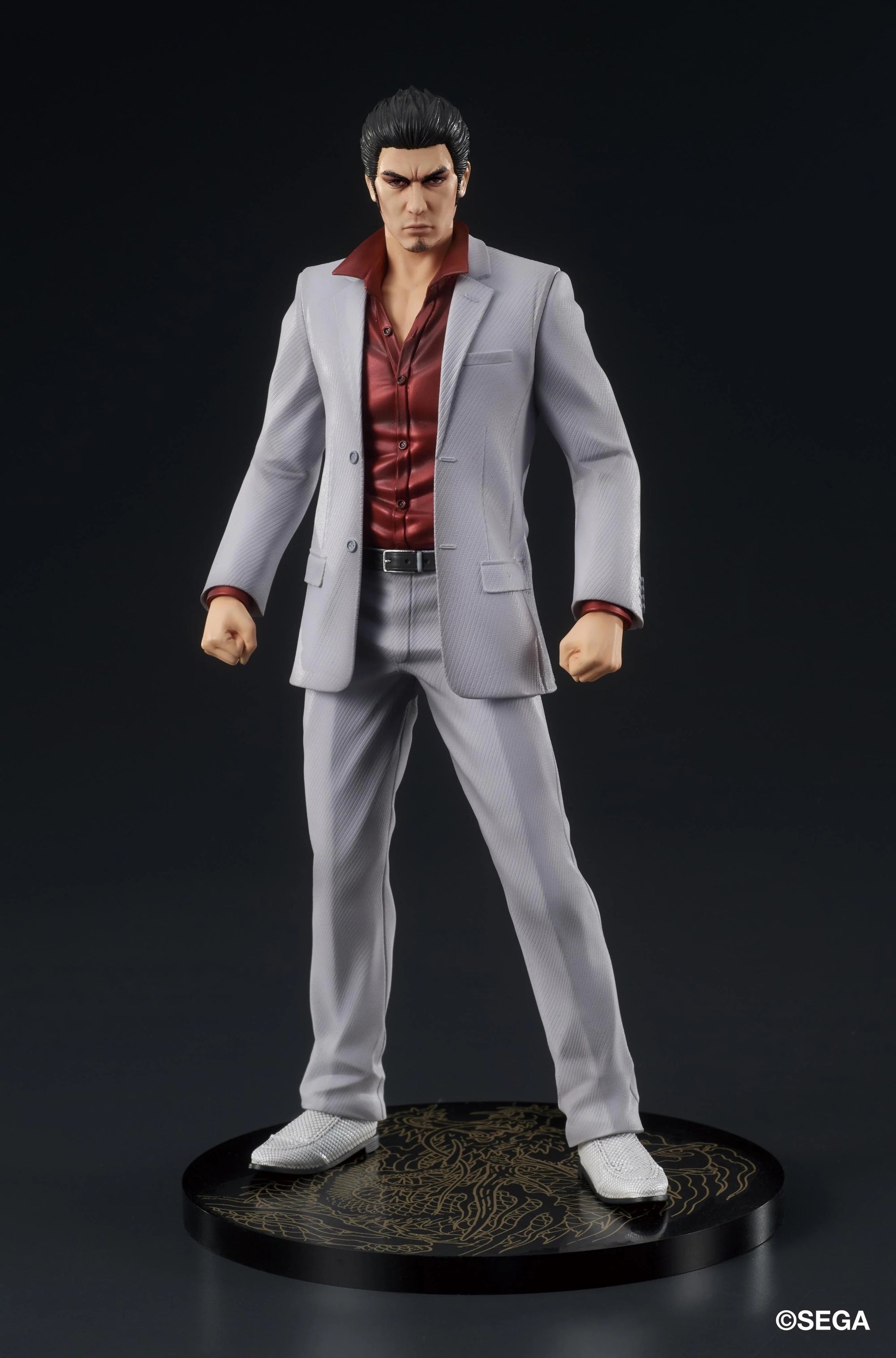 Full frontal view of the DIGSTA Yakuza Kazuma Kiryu figure, standing in his signature gray suit and red shirt on an Oryu dragon patterned base.