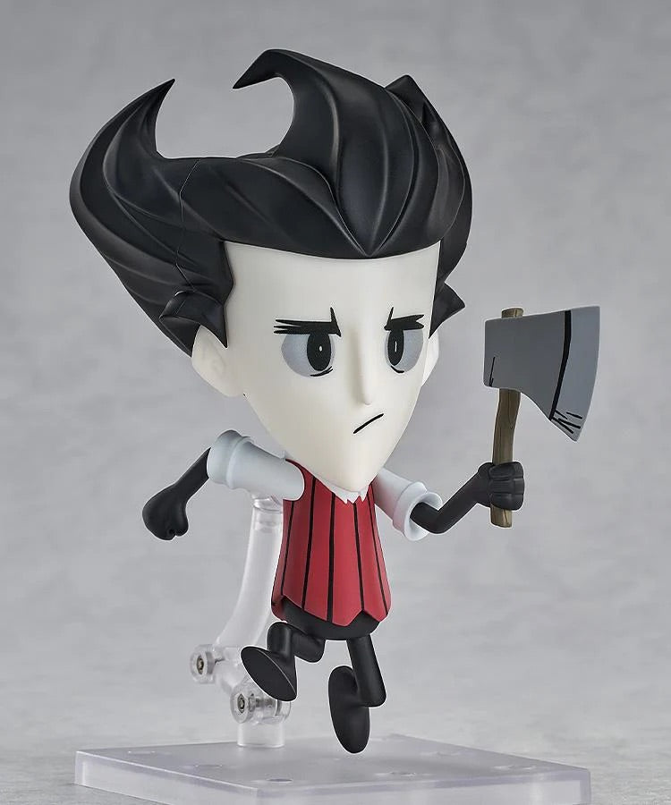 Nendoroid Wilson figure posed holding the large grey axe accessory, ready for resource gathering or defense.