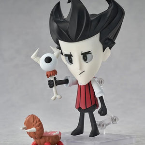 Nendoroid Wilson figure holding the "Eye Bone" accessory, with the small, brown Chester accessory at his feet.