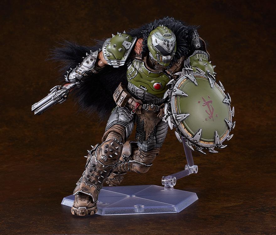 Fully articulated deluxe Doom Slayer figma action figure dynamically charging forward with his super shotgun readied and green shield extended.