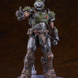 Studio shot of the Doom Slayer deluxe action figure gesturing with a confident thumbs-up using an interchangeable armored hand.