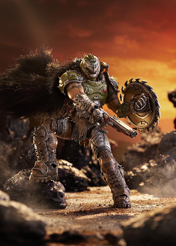 Dramatic action diorama featuring the figma Doom Slayer figure stepping over rocky terrain under a fiery orange sky, holding the super shotgun and chain shield.