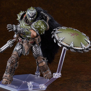Doom Slayer figma figure demonstrating the chain shield accessory mounted on a separate clear support arm to simulate a throwing or spinning action.
