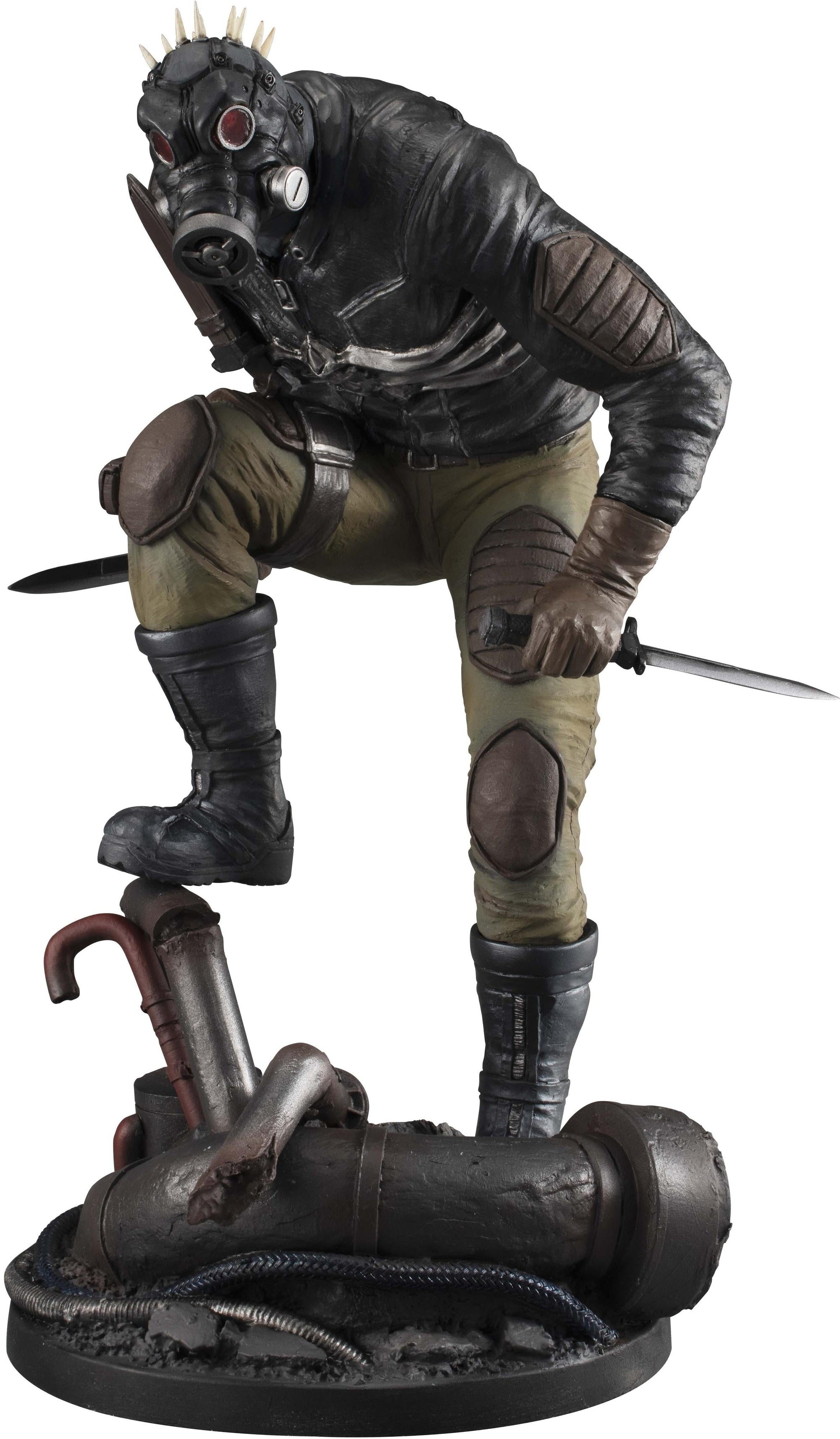Front view of the 1/8 scale Caiman figure from Dorohedoro wearing his iconic gas mask with spikes and holding dual knives on a debris base.