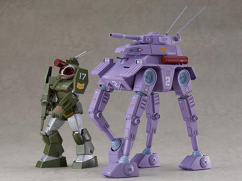 Size comparison of the 1/72 scale Crab Gunner model kit standing alongside a green Dougram CB armor unit.
