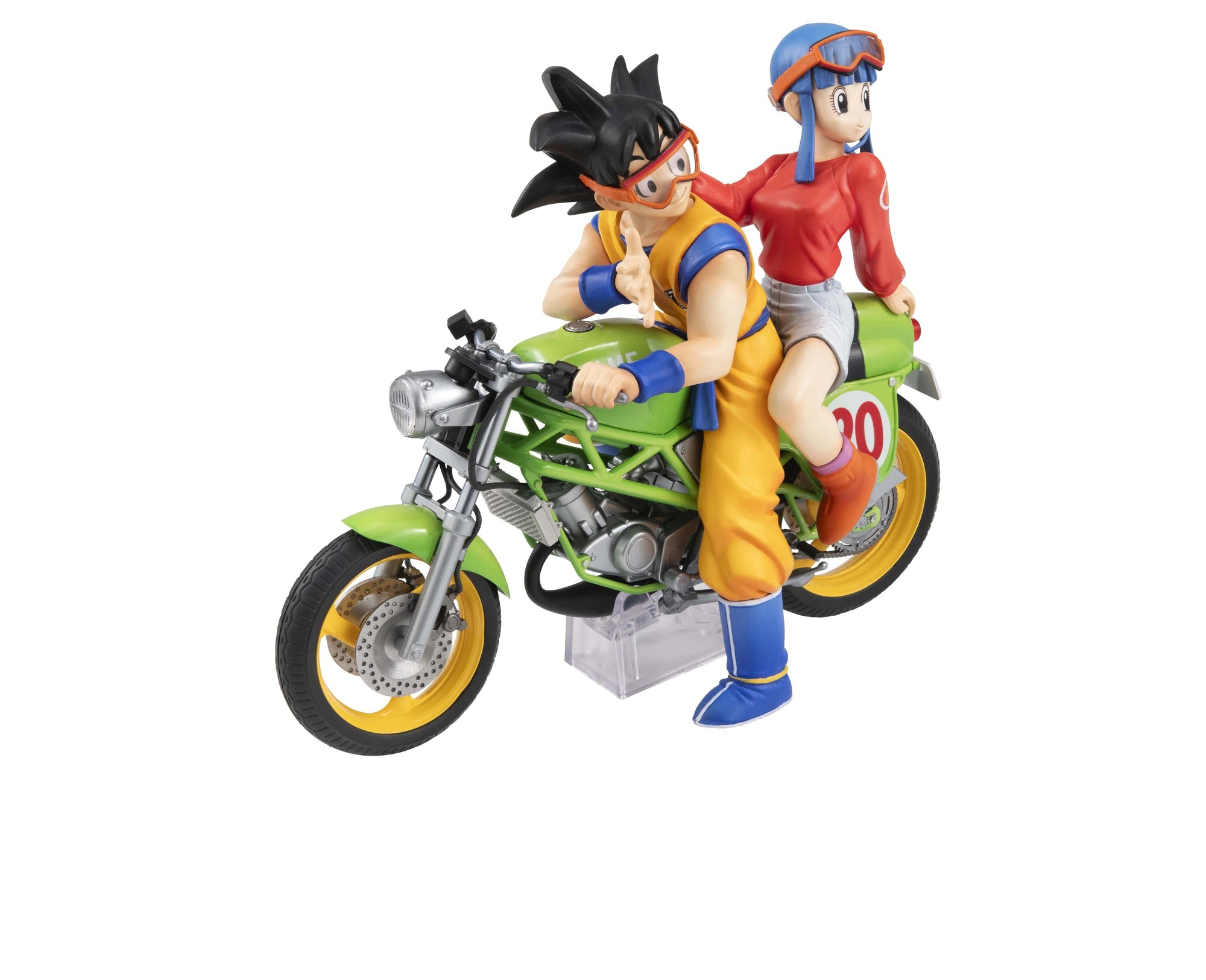 Front-facing view of the Son Goku and Chi-Chi figure showing Goku looking back with orange goggles while seated on a bright green bike.