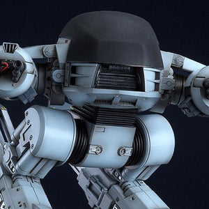 Detailed close-up of the ED-209 upper torso and dome, capturing the textured finish and mechanical arm cables.