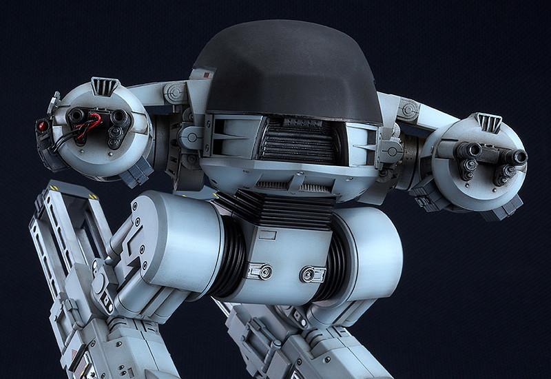Detailed close-up of the ED-209 upper torso and dome, capturing the textured finish and mechanical arm cables.