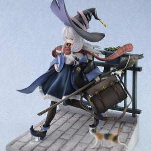Front left three-quarter angle view of the Elaina 1/7 scale figure showcasing her dynamic stride, large brown travel bag, and witch's broom on a cobblestone path.