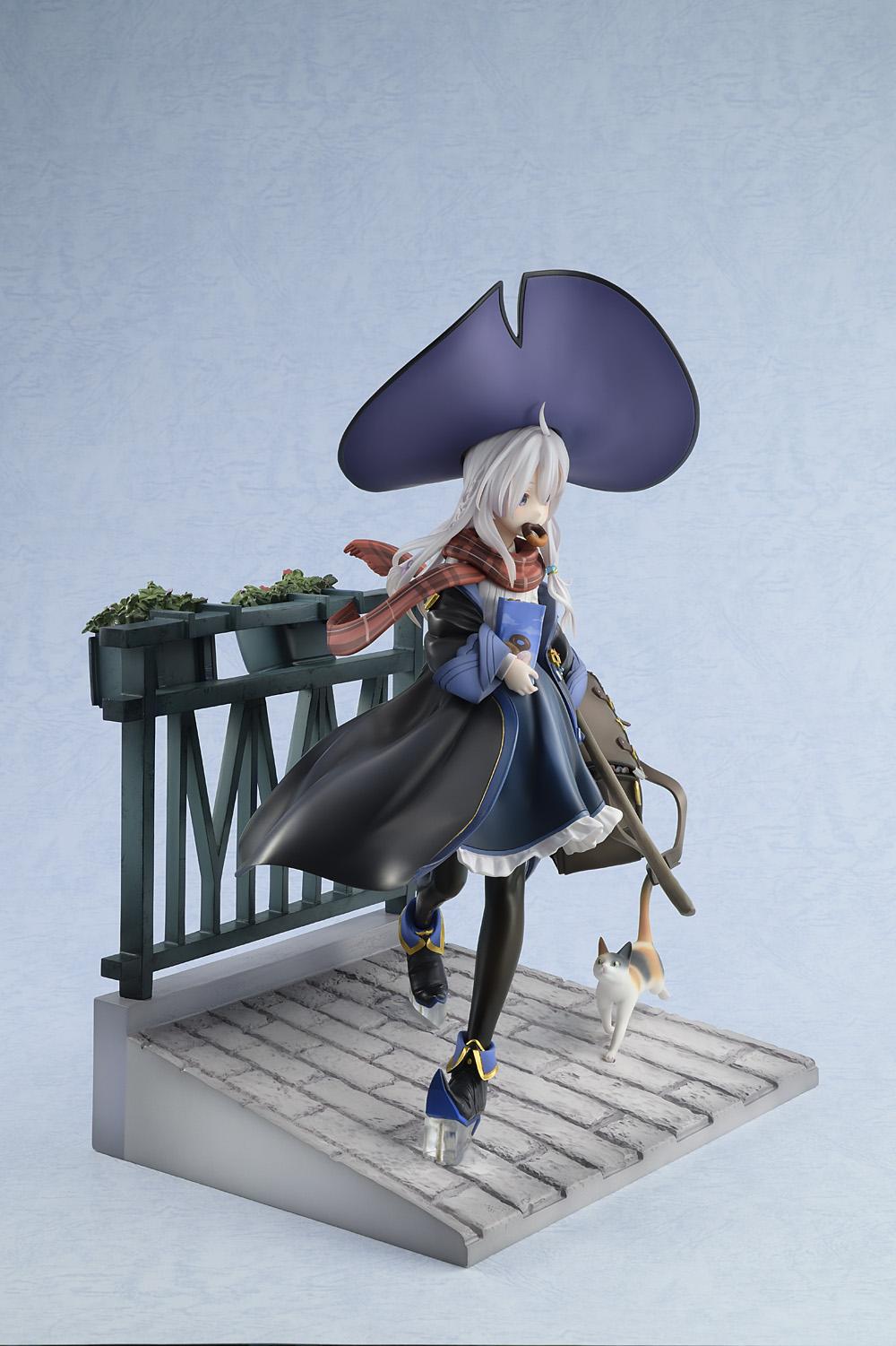 Right profile view of the Elaina witch scale figure accentuating her billowing black robe, long scarf, and the calico cat accessory walking alongside her.