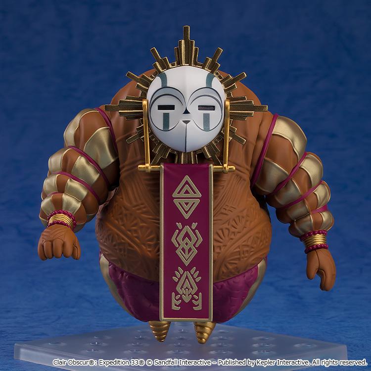 Front profile of the bulky Esquie Nendoroid figure mounted on a clear square display stand against a textured blue background.