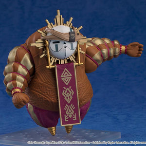 Front three-quarter shot of the Esquie Nendoroid figure wearing a tan fabric headband with a black number 33 emblem over its mask, pointing out with one hand.