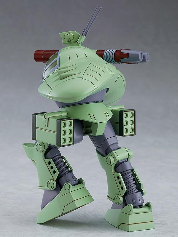 Dynamic side profile walking pose of the Cabarov AG9 Nicholaiev mecha plastic model kit, highlighting structural articulation and design proportions.