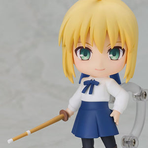 Front view of the Saber Casual Outfit Version Nendoroid figure holding a bamboo shinai, displayed on a clear plastic stand against a light gray background.