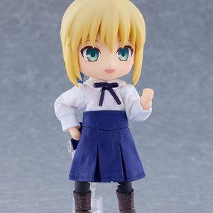 Saber Nendoroid Doll figure from Fate/Stay Night standing with a raised fist while wearing her fabric casual outfit.