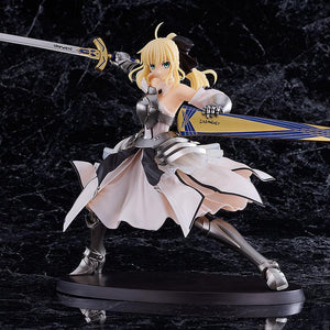 Front view of the Saber Lily (Distant Avalon) plastic model kit displaying her billowing dress and swords on a black marble background.
