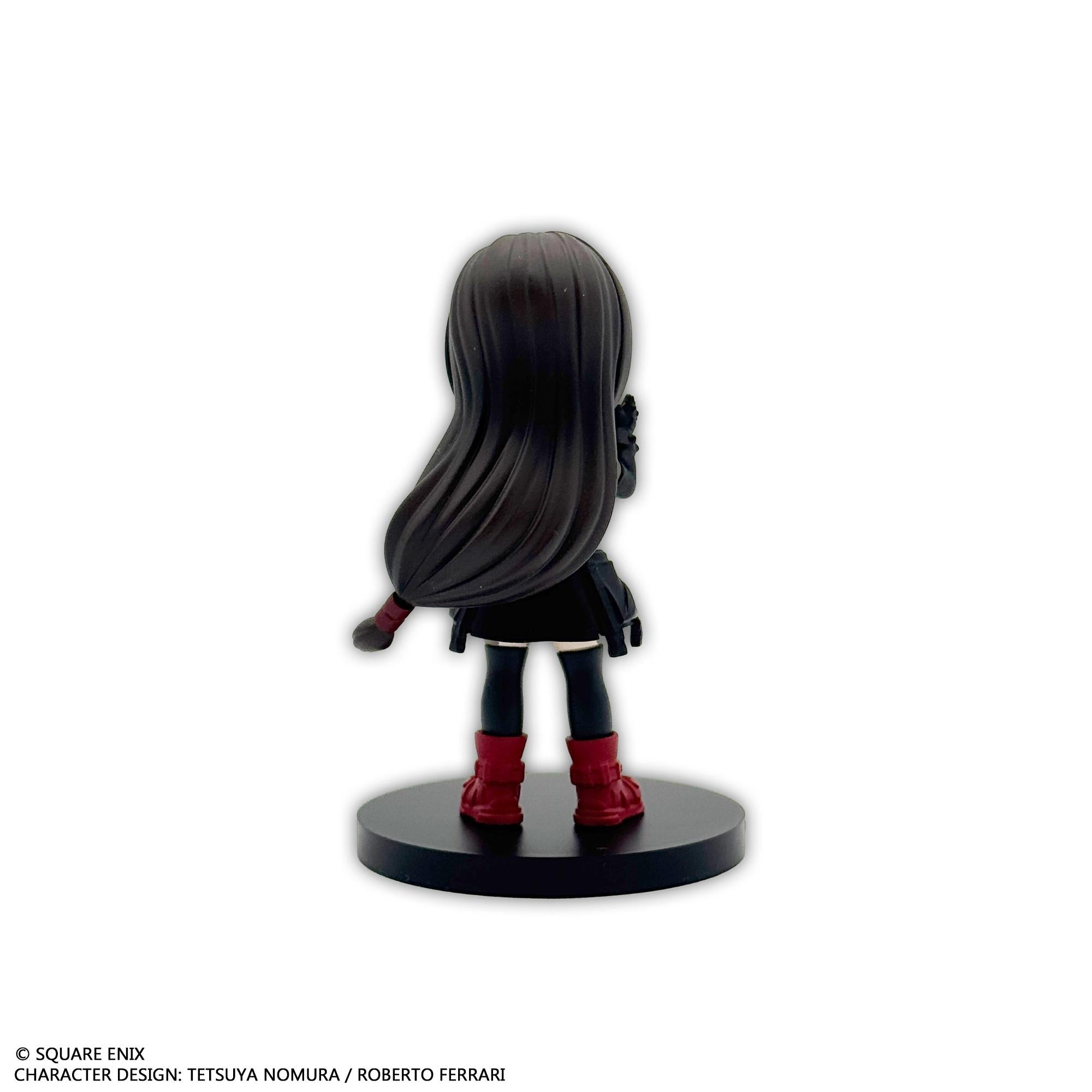 Rear individual view of the Tifa Lockhart mini figure, showing the back details of her long black hair tied at the tip.