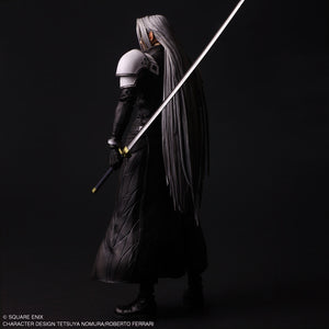 Rear view of Play Arts Shin Sephiroth figure showcasing detailed long silver hair and black coat.