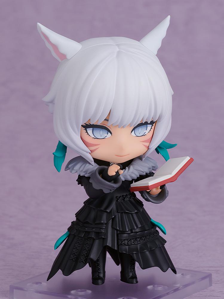 Final Fantasy XIV Y'shtola Nendoroid figure reading an open book accessory with her smiling face plate option.