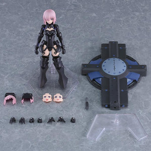 Flat lay display showing all included model kit contents, including the Mash figure, shield, face plates, hair parts, extra hands, and display stand.