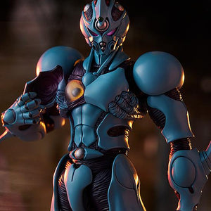 Cinematic low-angle shot of figma Guyver I: Ultimate Edition under dramatic nighttime lighting.