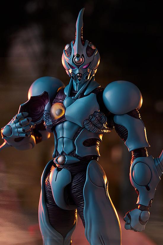 Cinematic low-angle shot of figma Guyver I: Ultimate Edition under dramatic nighttime lighting.