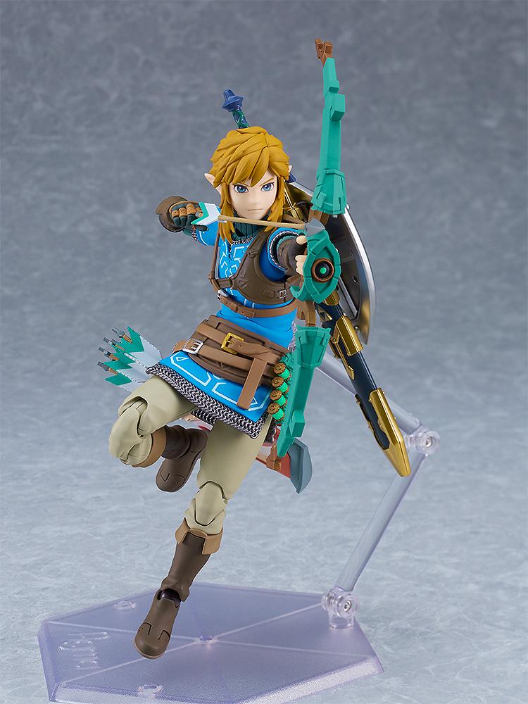 Dynamic action pose of Link jumping and aiming the Construct Bow with a notched arrow.