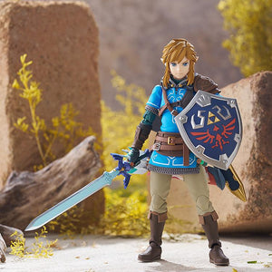 Link figma standing heroically with the Master Sword drawn and the Hylian Shield equipped.