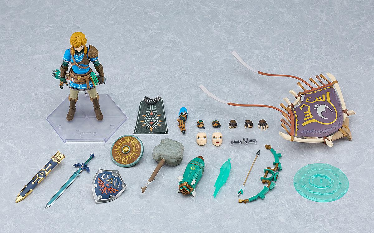 Overhead view of the Link figma figure standing with scabbard, shields, paraglider, and effect parts.