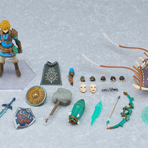 Overhead view of the Link figma figure standing with scabbard, shields, paraglider, and effect parts.