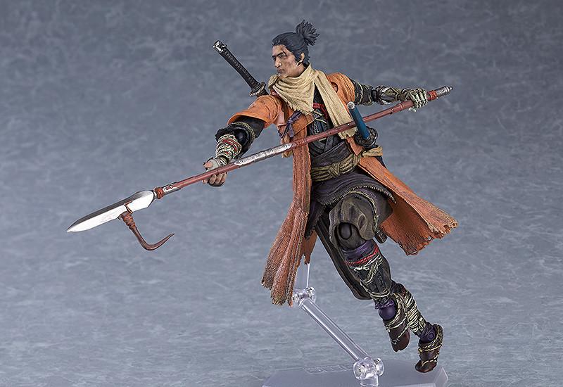 Dynamic jumping pose of the Sekiro figma figure wielding the long-range Loaded Spear shinobi prosthetic tool.