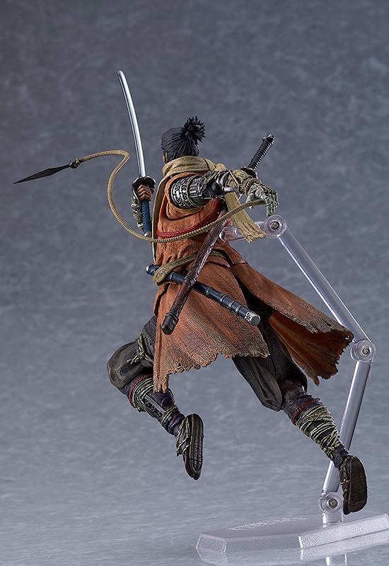 Dynamic jumping pose of the Sekiro figma action figure utilizing the grappling hook prosthetic for vertical movement.