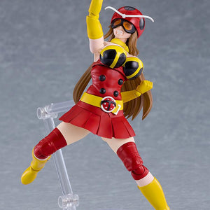 High-energy action pose of figma Yuriko Okada with gritted-teeth expression raising a fist into the air.