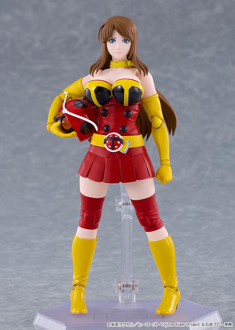 Full front standing view of figma Yuriko Okada displayed unmasked while holding her red Electro-Wave Human Tackle helmet under her arm.