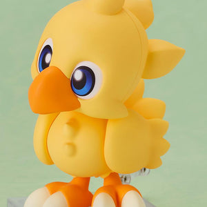 A side profile of the Chocobo Nendoroid figure showing the feathered tail and rounded body design.