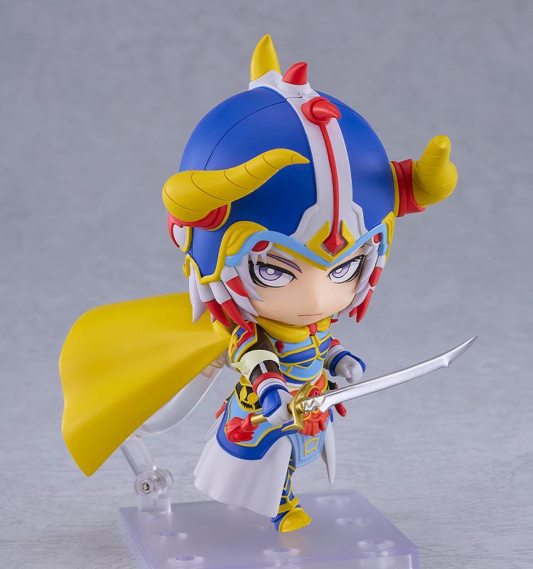 Action pose of the Warrior of Light Nendoroid figure lunging forward with a silver sword accessory.