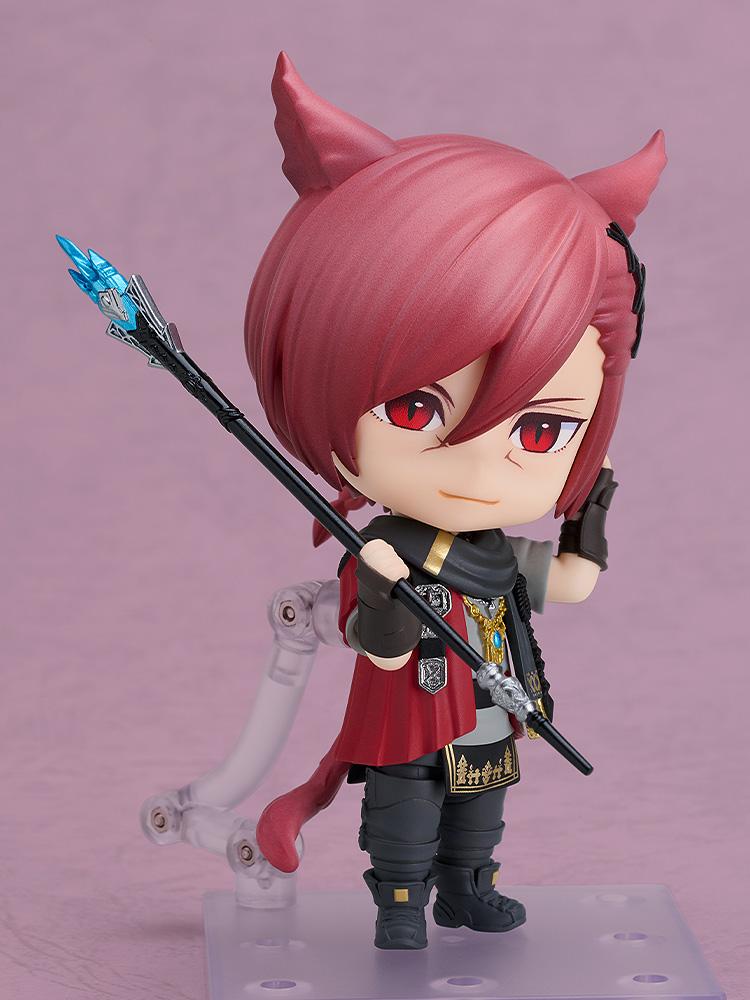 G'raha Tia Nendoroid action figure posing with the Scion's Arc rod held diagonally across his shoulder.