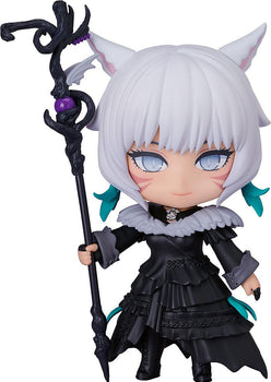 Full-body front view of the Final Fantasy XIV Y'shtola Nendoroid figure holding her Nightseeker staff with a subtle smile on an isolated white background.