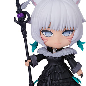 Full-body front view of the Final Fantasy XIV Y'shtola Nendoroid figure holding her Nightseeker staff with a subtle smile on an isolated white background.