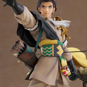Detailed close-up of Claude's face sculpt, braided hair accent, earring, and patterned Leicester Alliance sash.