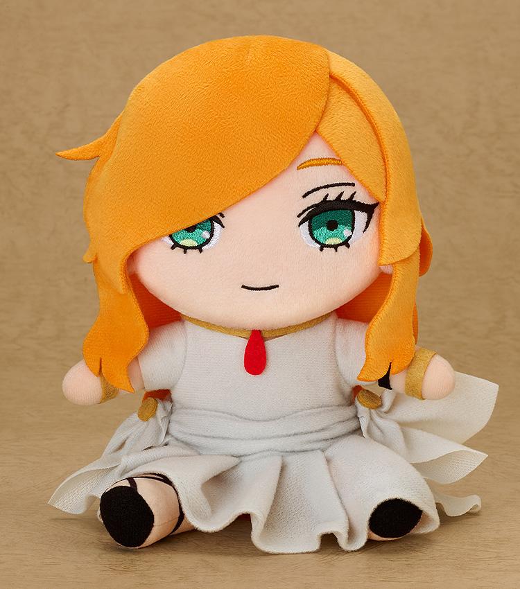 Studio shot of the Flamme 6.7-inch plush sitting against a neutral background, showing embroidered green eyes and red jewel detail.
