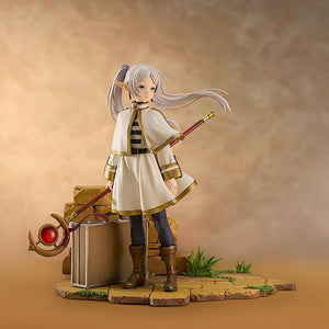 Wide shot of the Frieren Magic of the Eventide Glow figure against a warm, atmospheric background.