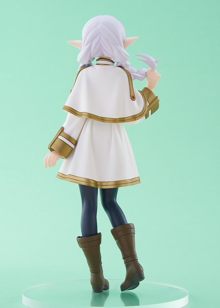 Rear studio angle of the POP UP PARADE Frieren figure showcasing the intricate details of her white capelet, braided hair texture, and dark leggings.